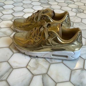 Nike Air Gold Metallic tennis shoes size 7.5 US Women’s
